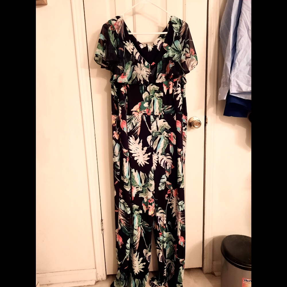 Tropical print jumpsuit with flutter sleeves. Size 22/24